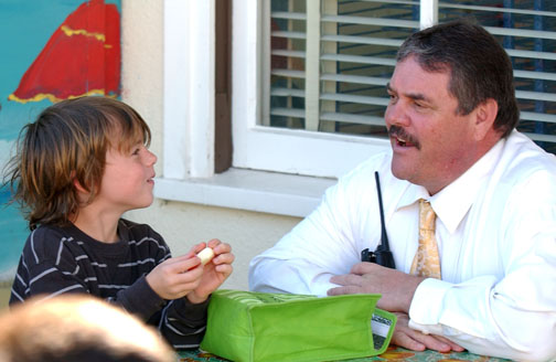 Marquez Principal Phillip Hollis chats with student Kade Newell during nutrition on Tuesday. Hollis was selected as elementary school Principal of the Year in Region 16.